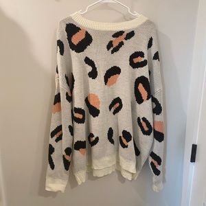 Perfectly Priscilla pink animal print sweater